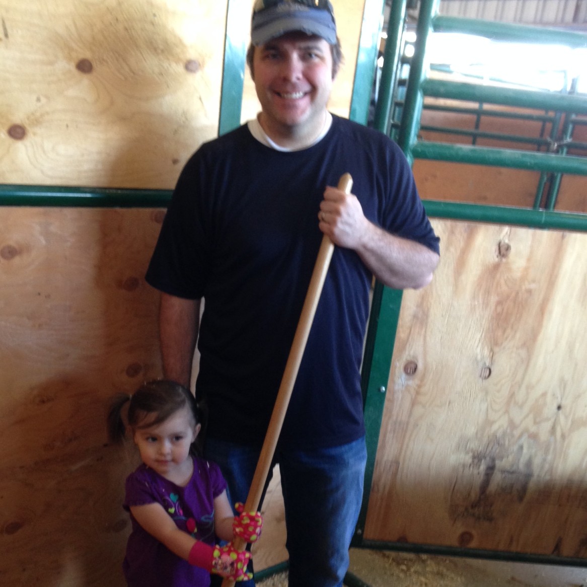 Oaklee and Dad helping with the show chores.